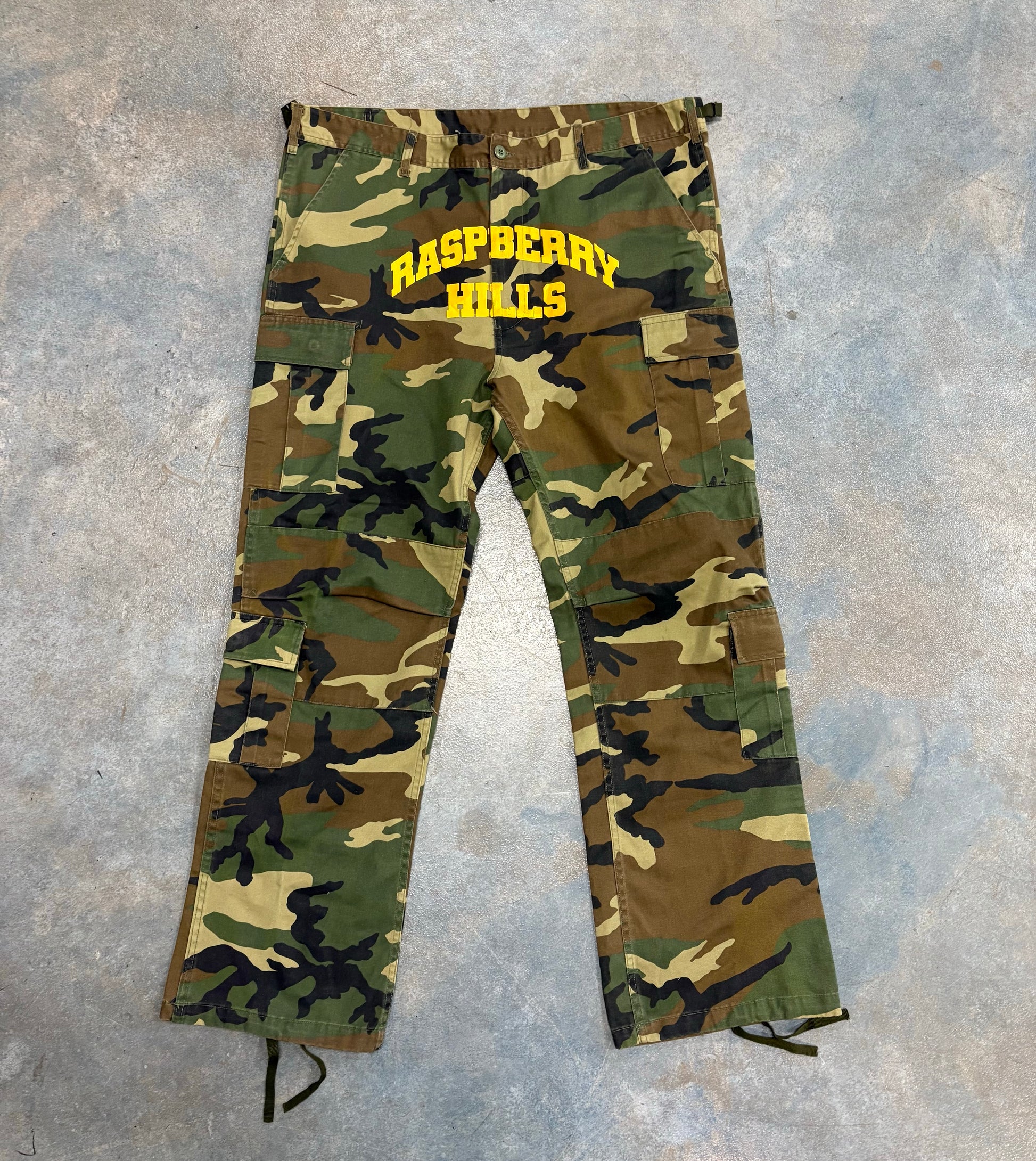 Raspberry Hills Camo Yellow Writting Pants OTF