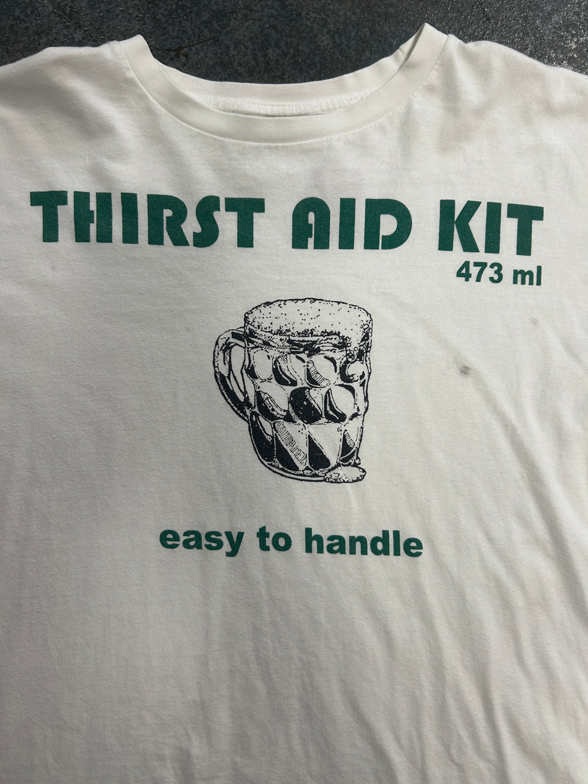 Thirst Aid Kit 473 Ml White Tee Green Lettering