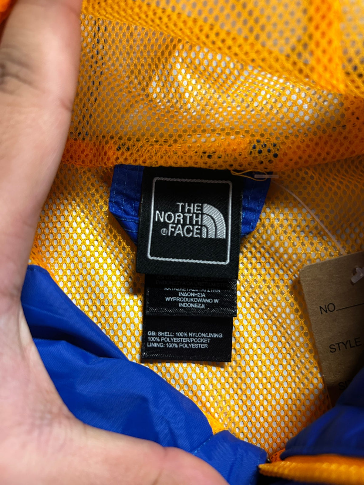 The North Face Blue Orange Lining Windbreaker